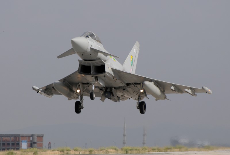 Photo 45.JPG - A 3 (F) Sq "Typhoon" in flight over the minarets of Konya